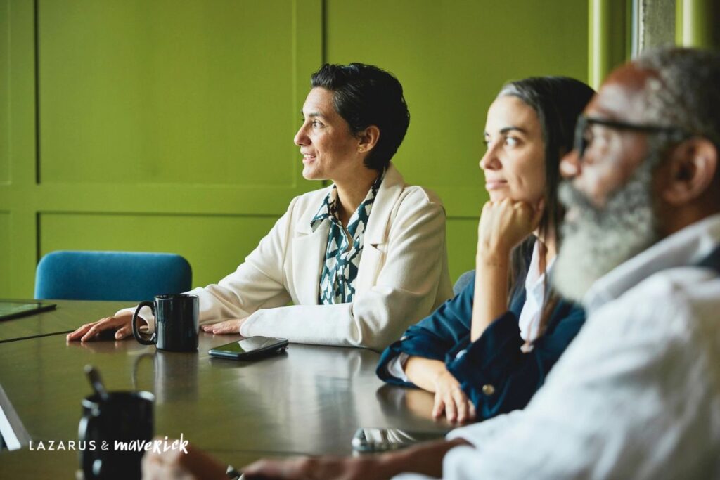 Board directors in discussion around a boardroom table